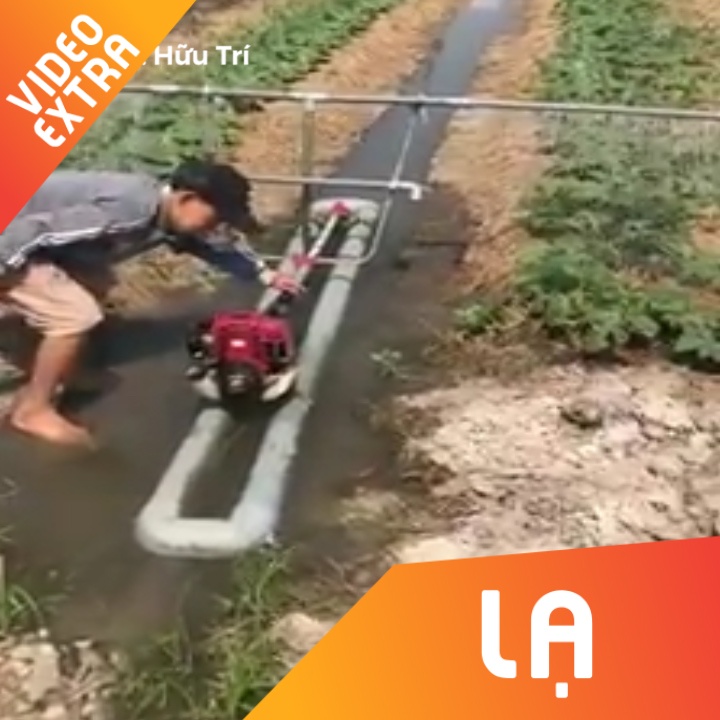 Chang trai Viet Nam che tao may tuoi bang dong co may cat co hinh anh