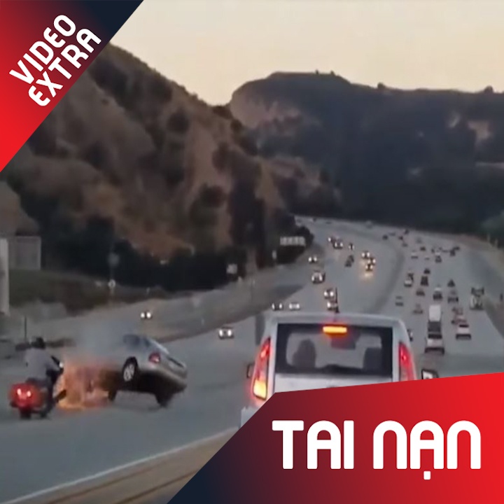 Tai nan khi xuong doc, mot xe hoi lat ngua o nuoc ngoai hinh anh