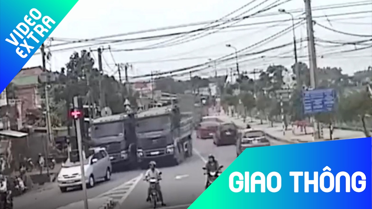 Hai xe ben dua toc do kinh hoang tren duong o Dong Nai hinh anh