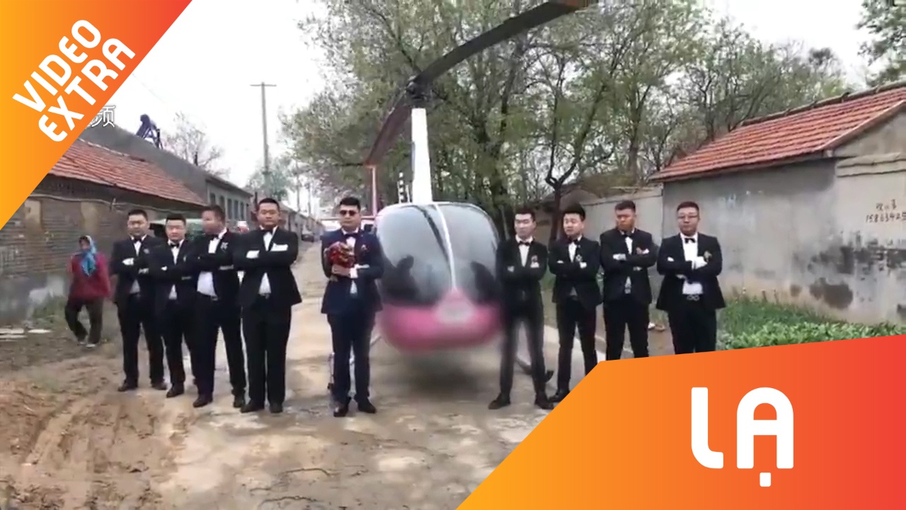 Ruoc dau bang truc thang va dan xe sang tai Trung Quoc hinh anh