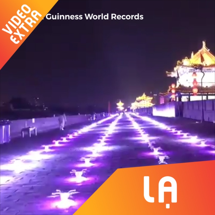 Nghe thuat trinh dien anh sang bang flycam tren bau troi Trung Quoc hinh anh