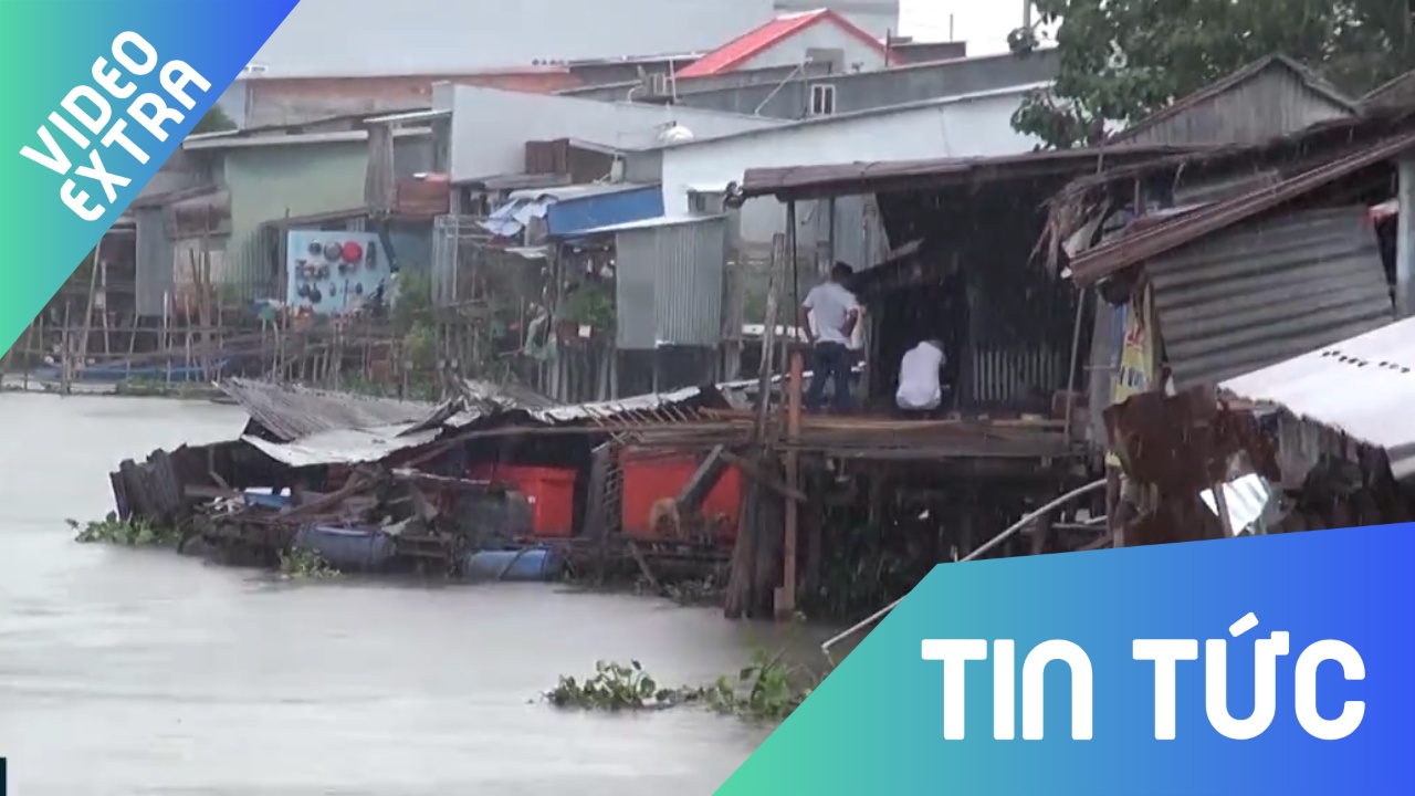 Nguy co tai nan vi nha cat ven song hinh anh