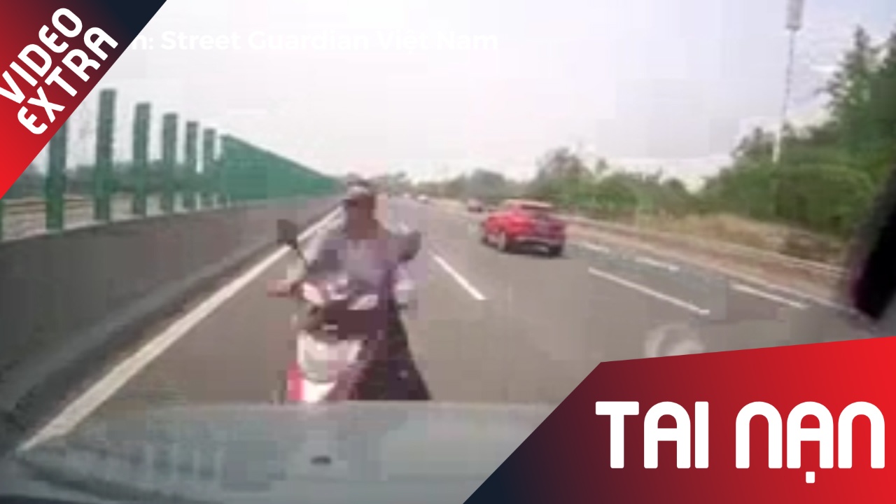 Vuot au, xe may bi tong vang hang chuc met hinh anh