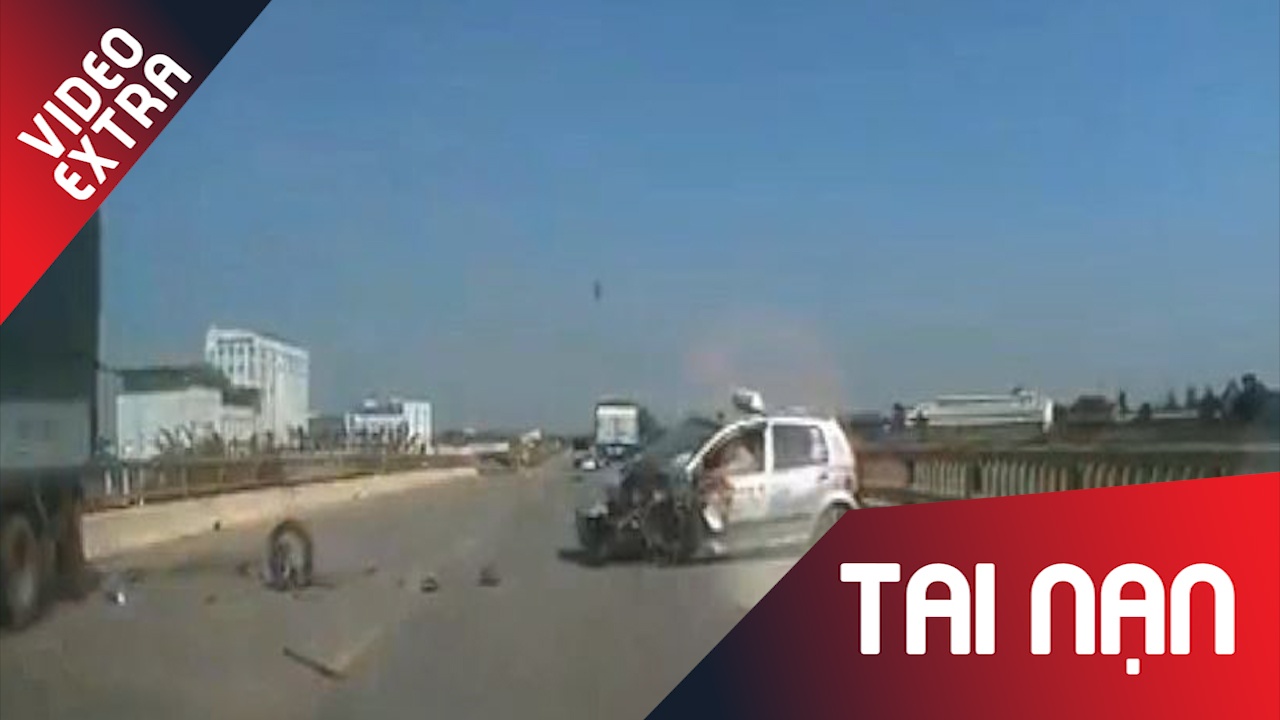 Xe taxi chay nguoc chieu gay tai nan nghiem trong hinh anh