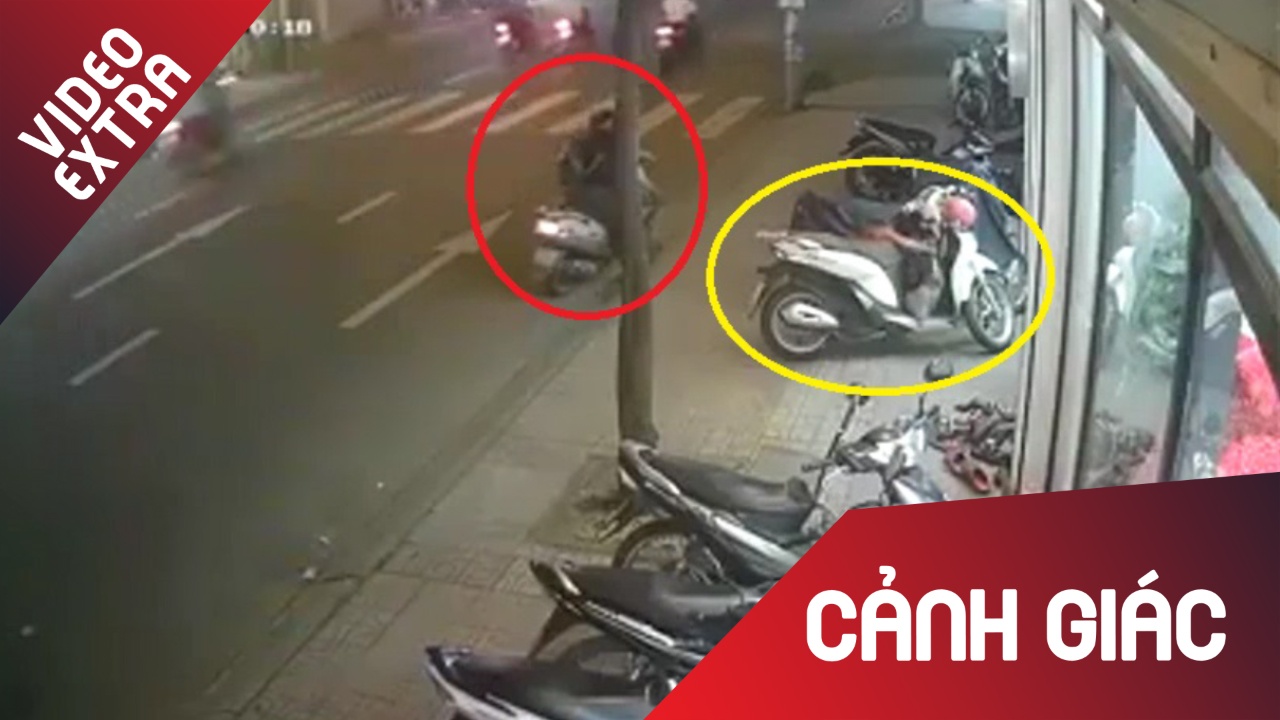 Nguoi phu nu cho tre nho di trom do o TP.HCM hinh anh