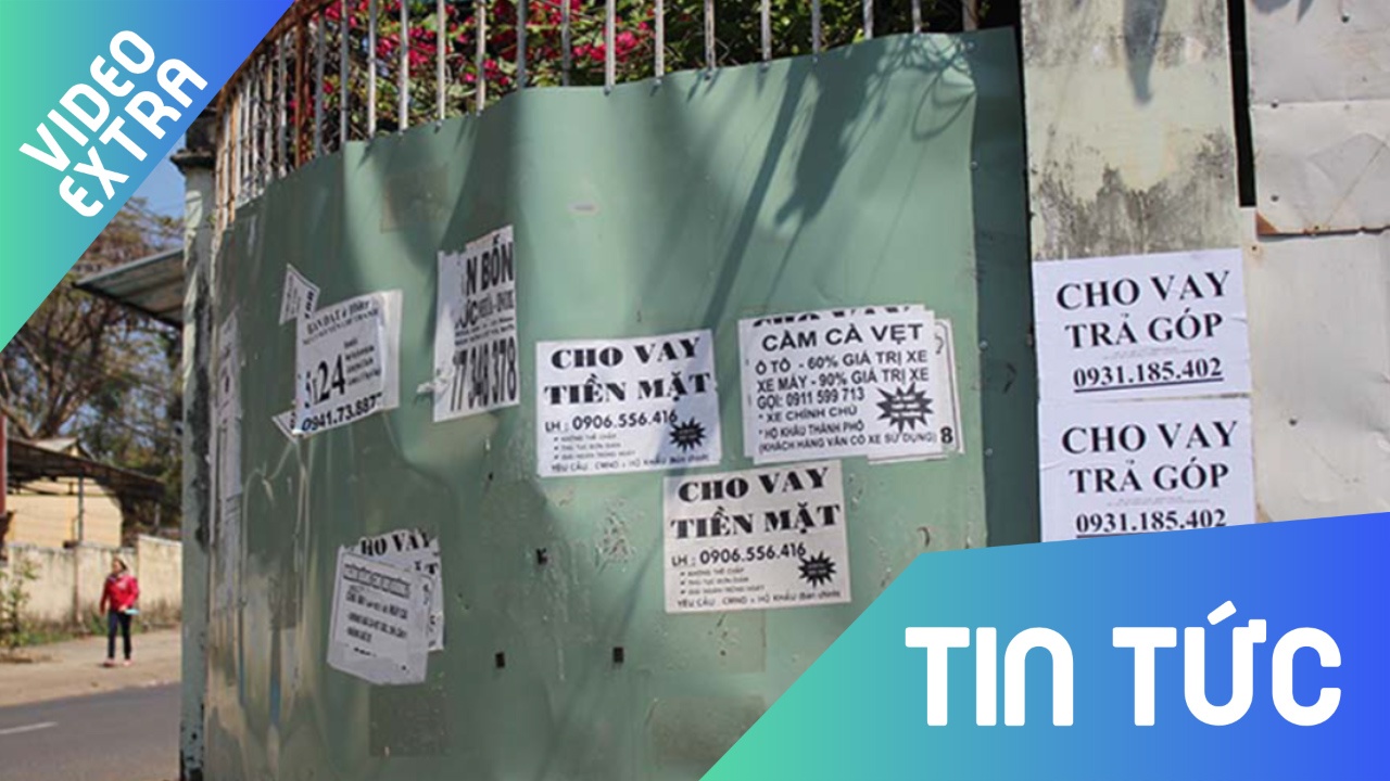 Quang cao cho vay nang lai xuat hien day dac trong thanh pho hinh anh