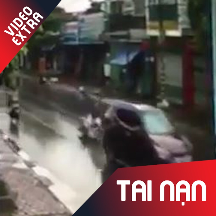 Xe may nga nhao xuong duong, tai xe bi can tu vong hinh anh