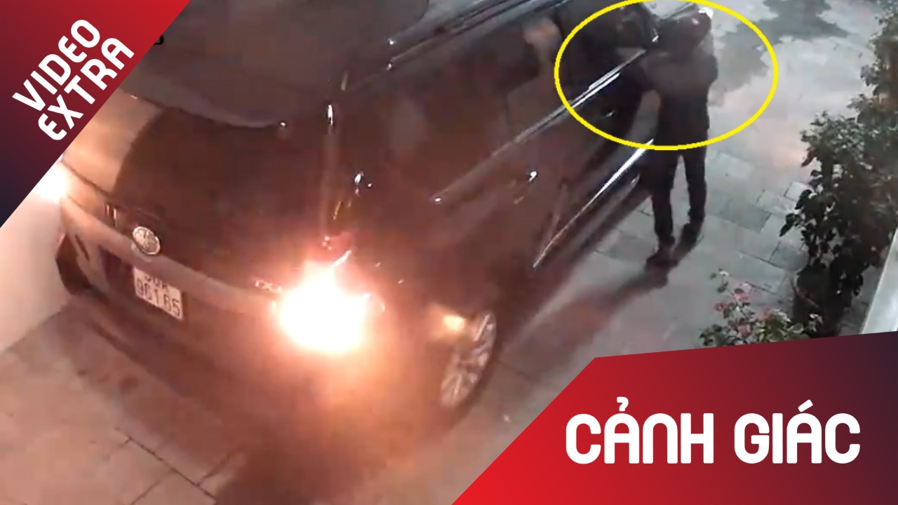 Bat chap co bao dong, trom van ngang nhien vat guong oto trong 30 giay hinh anh