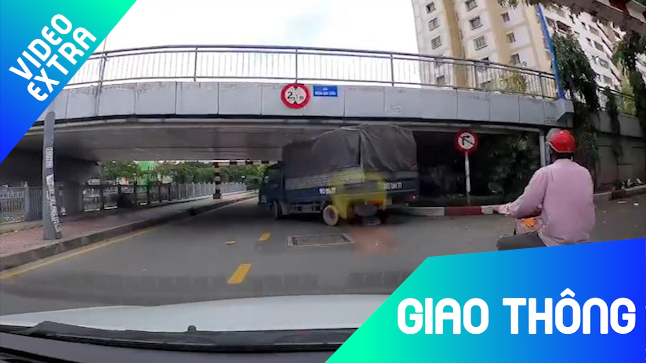 Xe tai vuot, suyt lam gay thanh chan chan cau hinh anh