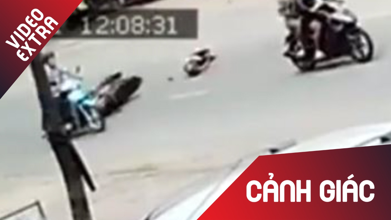 Co gai bi 2 ten cuop giat tui xach, keo le tren duong o Dong Nai hinh anh