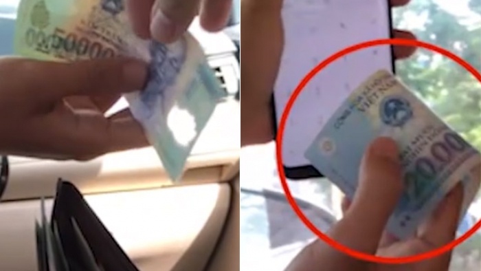 Man phu phep ‘dong 500.000 thanh 20.000' cua cac taxi dom tai TP.HCM hinh anh