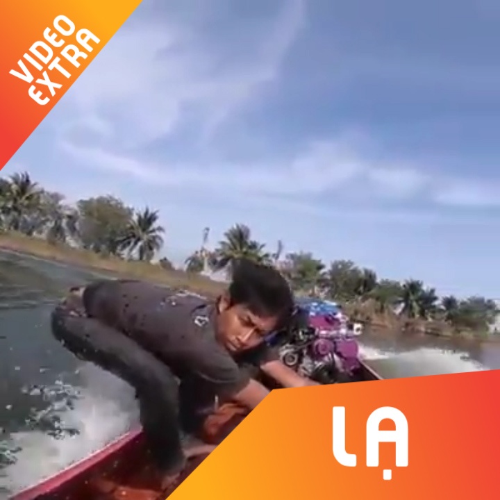 Nguoi lai xuong bo cua muot tren song nhu tay dua F1 hinh anh