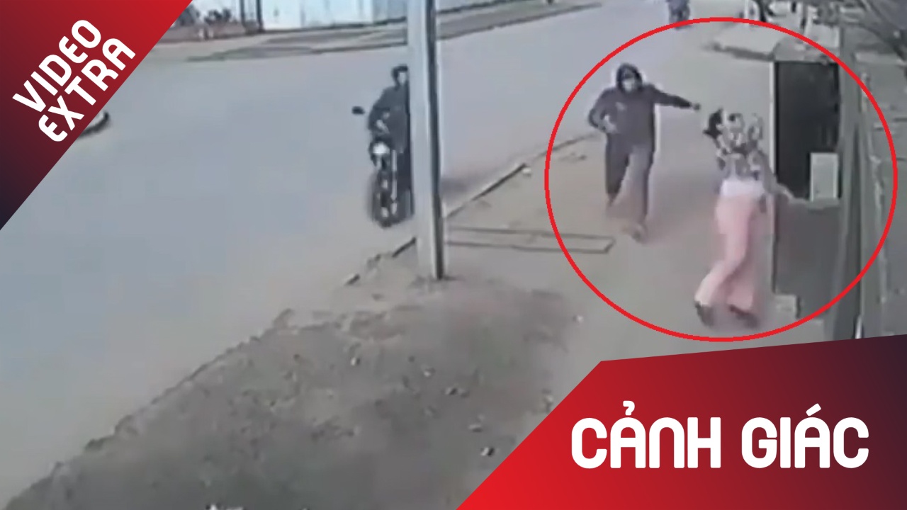 Nguoi phu nu nhanh tri nem tui xach qua tuong nha khi bi cuop hinh anh