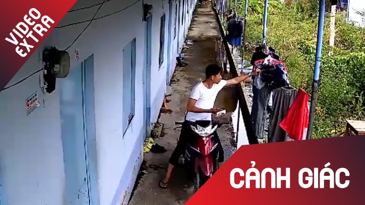 Nam thanh nien 'can than' lua quan ao de trom hinh anh