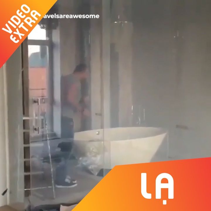 Nha tam tu dong thay doi cua kinh khi co nguoi su dung hinh anh