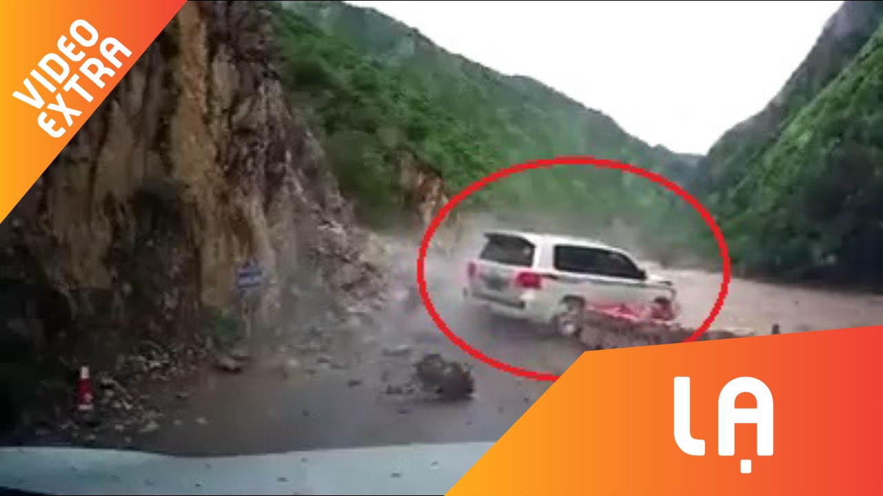 Ngon nui bat ngo do sap ngay truoc dau oto o Trung Quoc hinh anh