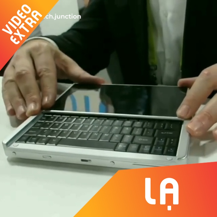 Ket hop hai chiec dien thoai nho de thanh mot may tinh hinh anh