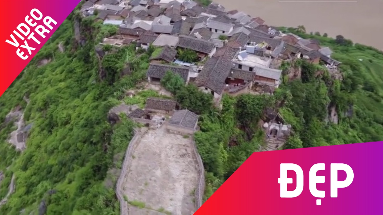 Ngam ngoi lang Trung Quoc xay tren mot tang da cuoi khong lo hinh anh