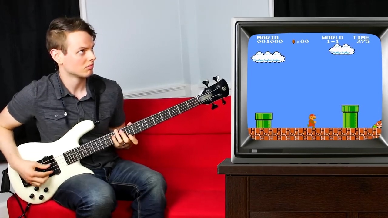 Choi nhac nen, am thanh tro Mario chi voi cay dan guitar dien hinh anh