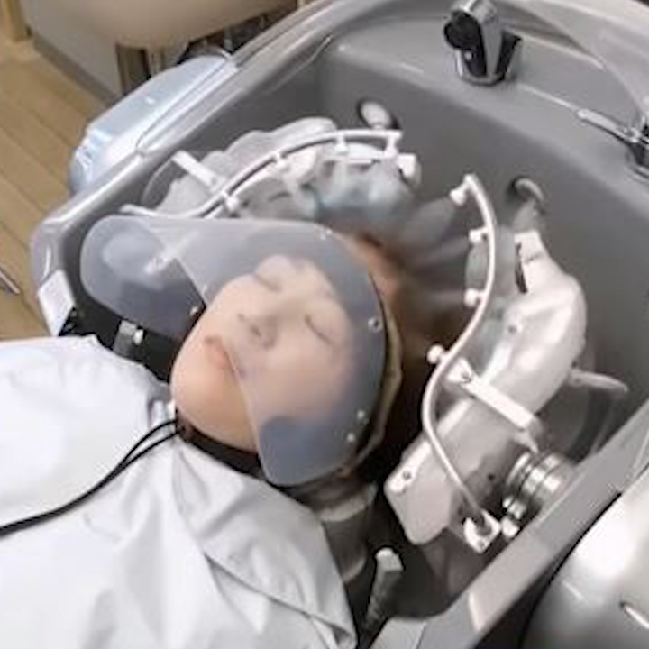 Robot goi dau voi 24 ngon tay thong minh cua Nhat Ban hinh anh