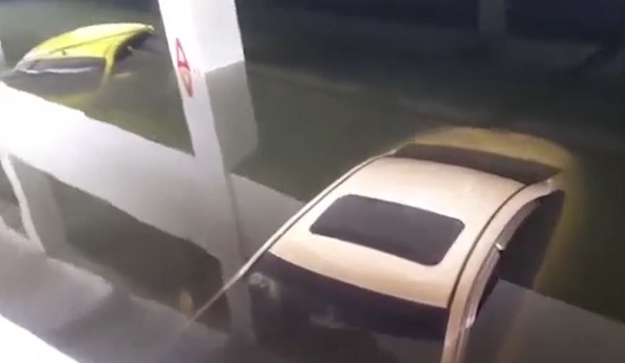 Xe cuu hoa giai cuu oto 'chet chim' duoi ham chung cu cao cap Da Nang hinh anh