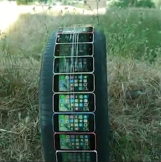 50 chiec iPhone lan tu tren nui xuong vuc hinh anh