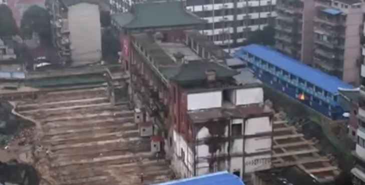 Trung Quoc di doi toa nha 5.000 tan trong 40 gio hinh anh