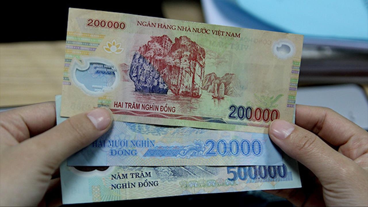 Cach phan biet tien that, tien gia hinh anh