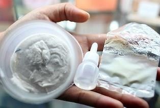 Mat co gai sui nhu 'vo mit' sau khi dung thuoc trang da hinh anh