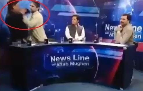 Chinh tri gia va nha bao lao vao danh nhau giua chuong trinh truc tiep hinh anh