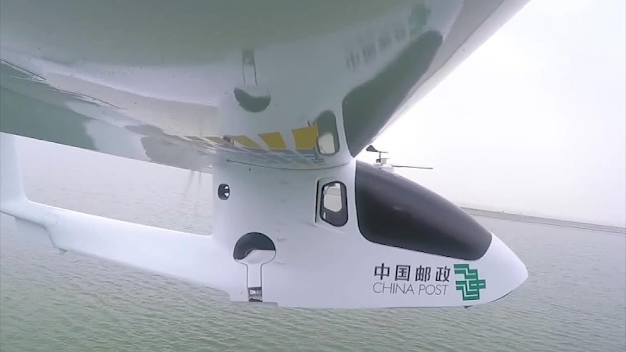 May bay khong nguoi lai giao hang qua bien tai Trung Quoc hinh anh
