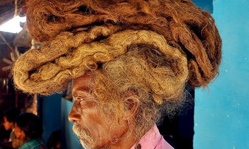 Di nhan khong cat toc, goi dau suot 40 nam de giu 'phuoc lanh' hinh anh