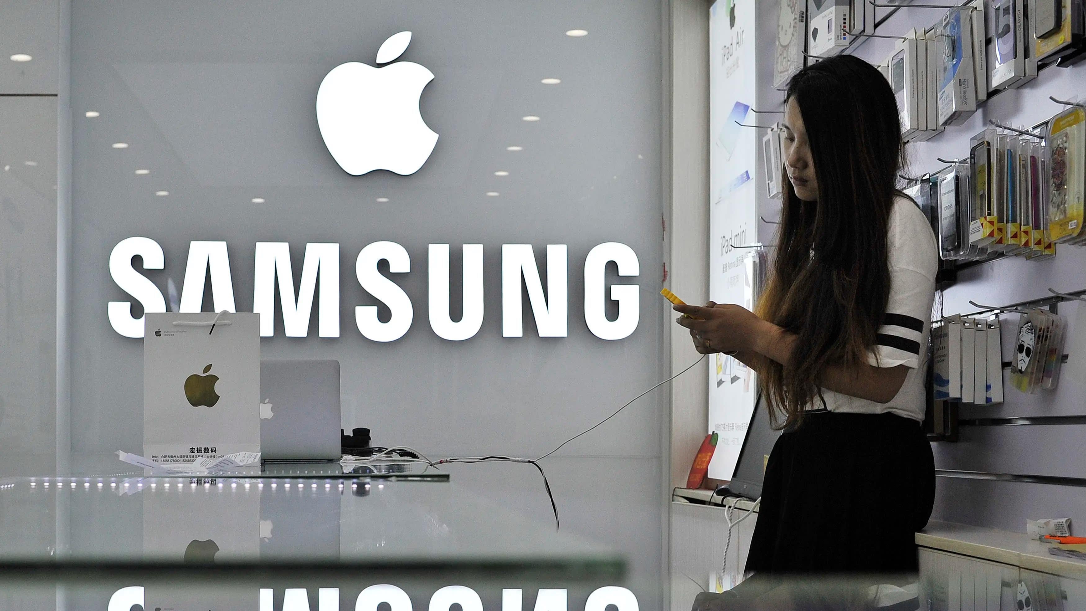 Dien thoai Apple va Samsung lep ve tai Trung Quoc hinh anh