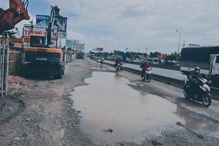 Nguoi dan TP.HCM lien tiep bi nga vi o ga, o vit tren quoc lo 1 hinh anh