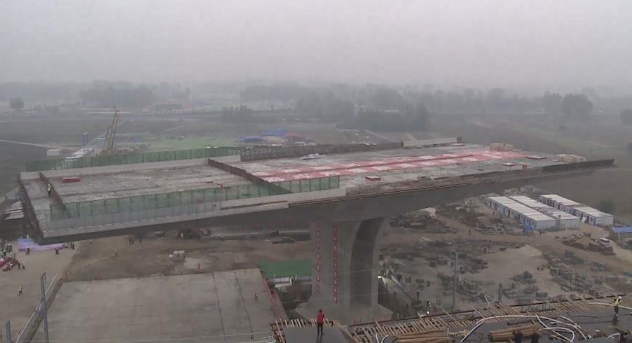 Can canh xoay cay cau 20.000 tan chi trong 2 tieng o Trung Quoc hinh anh