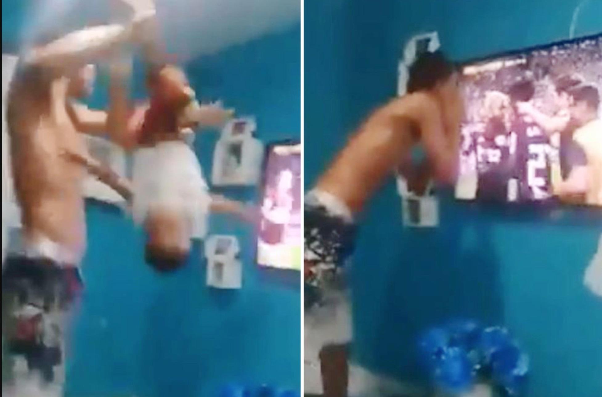 Ong bo nam chan doc nguoc be trai de an mung doi bong chien thang hinh anh