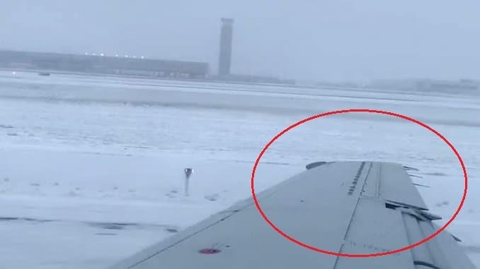 May bay truot khoi duong bang phu tuyet khi ha canh hinh anh