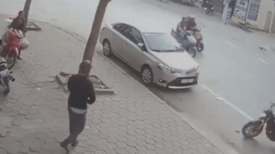 Biker di xe phan khoi lon nga lam vo den oto hinh anh