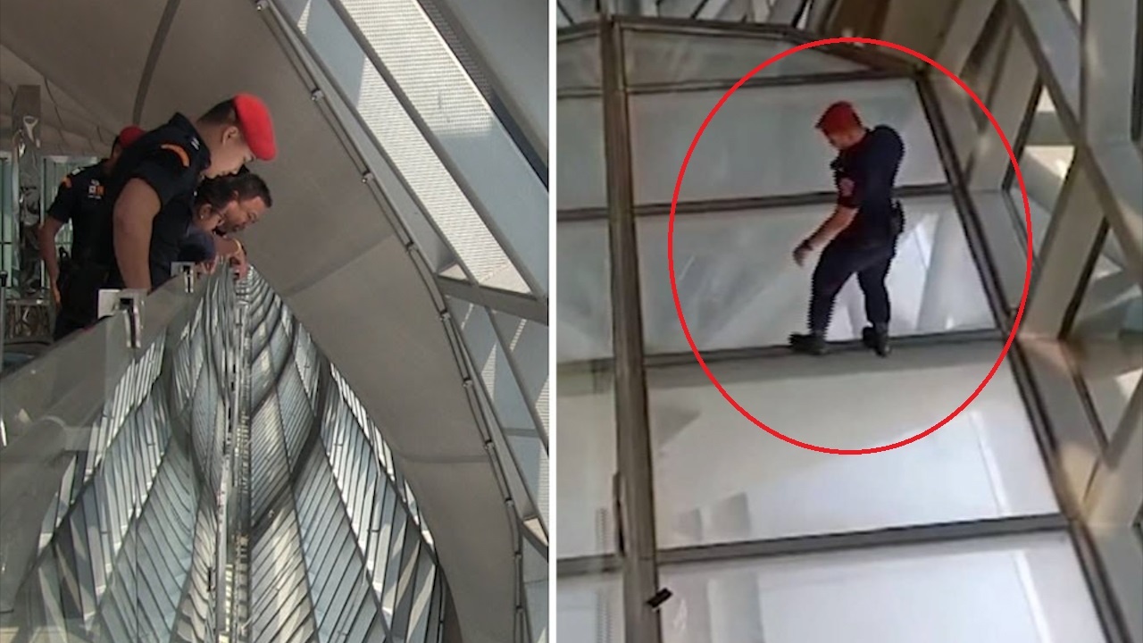 Nam nhan vien nhay tu do cao 15 m nhat giup dien thoai cho khach hinh anh