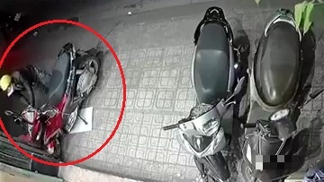 Trom xe may trong 18 giay o TP.HCM hinh anh