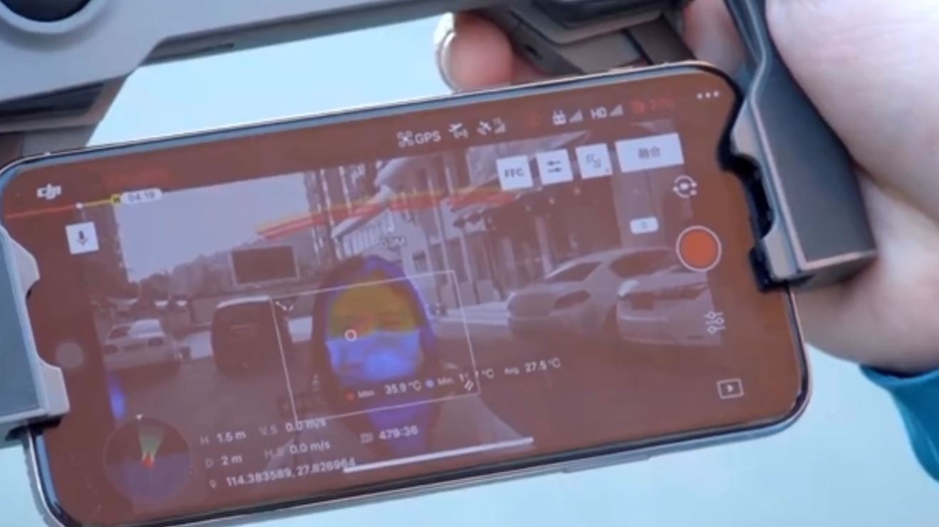 Trung Quoc dung drone quet than nhiet kiem tra suc khoe nguoi dan hinh anh