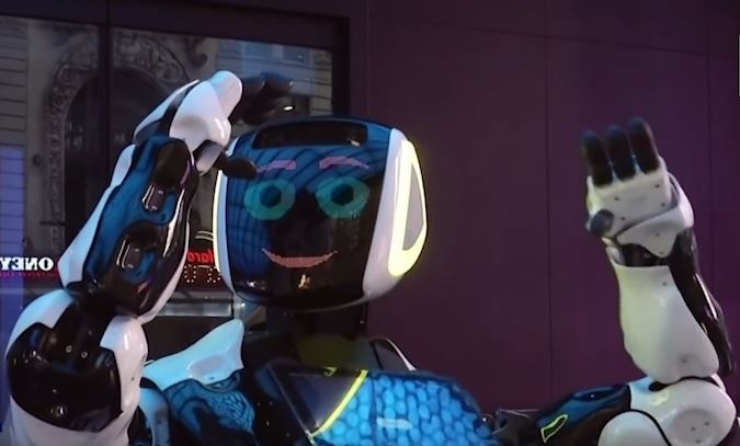 Robot huong dan ve virus corona giua duong pho New York hinh anh