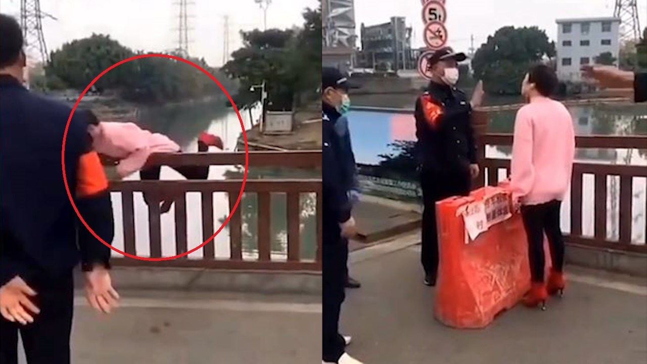 Bi tu choi qua tram kiem dich, nguoi phu nu treo qua lan can cau hinh anh