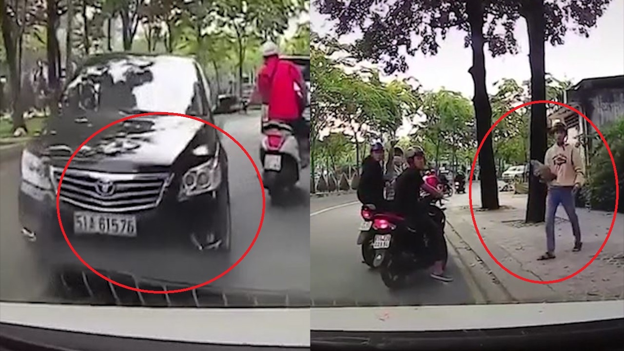 Phanh gap tranh oto di nguoc chieu, tai xe bi nhom di xe may gay han hinh anh