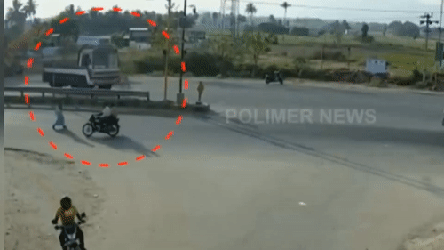 Tai xe say xin lai xe tai dam do cot den giao thong hinh anh