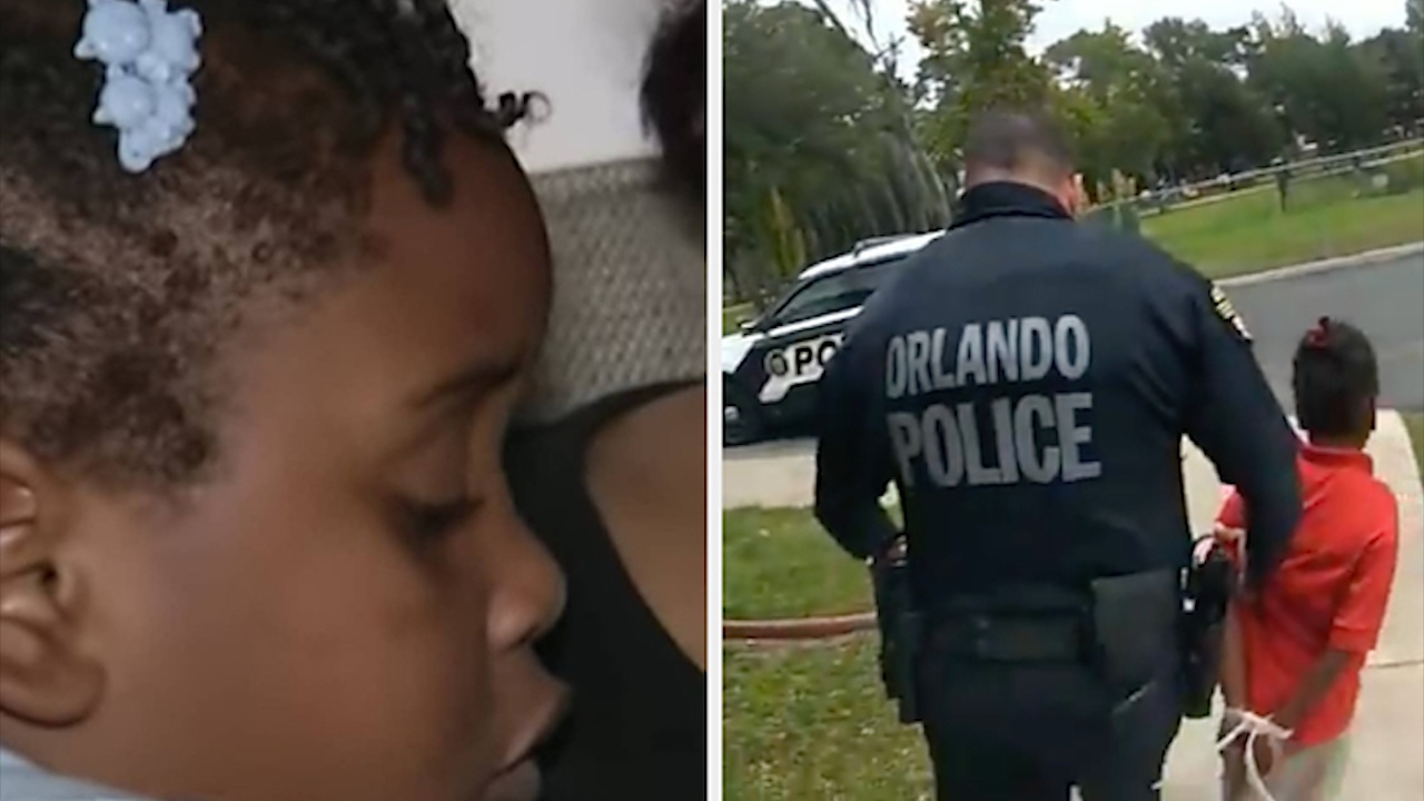 Canh sat My troi tay bat giu be gai 6 tuoi hinh anh