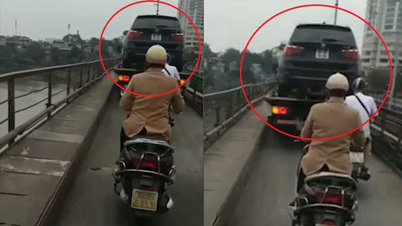 Xe cuu ho cho oto qua cau Long Bien bat chap bien cam hinh anh