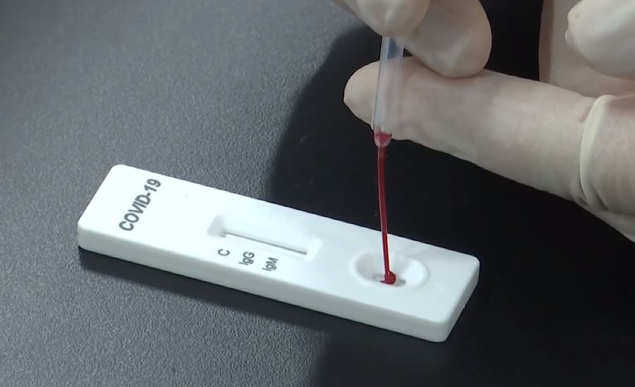 Trung Quoc phat trien que thu nhiem benh covid-19 trong 15 phut hinh anh