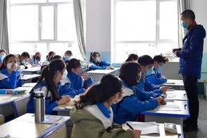 Trung Quoc mo lai hang nghin truong hoc sau 3 thang dong cua hinh anh