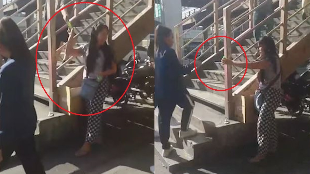 Co gai phat nuoc rua tay mien phi cho nguoi di duong hinh anh